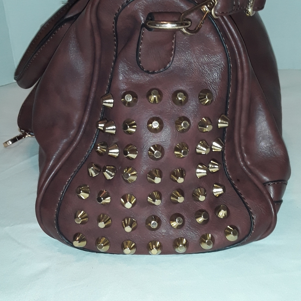 MMS gold studded crossbody satchel.